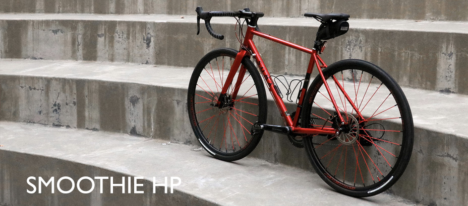 red bike on curved cement steps