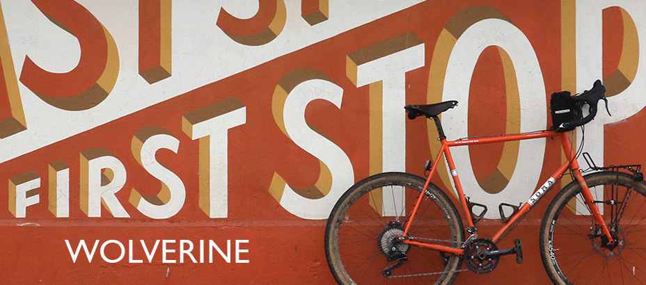 orange bike against orange mural